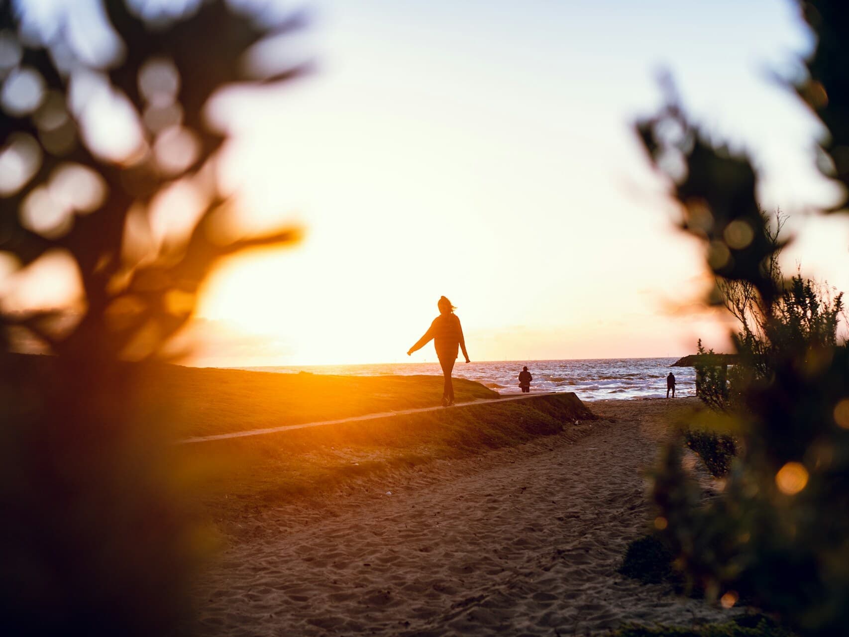 A woman walking on the beach